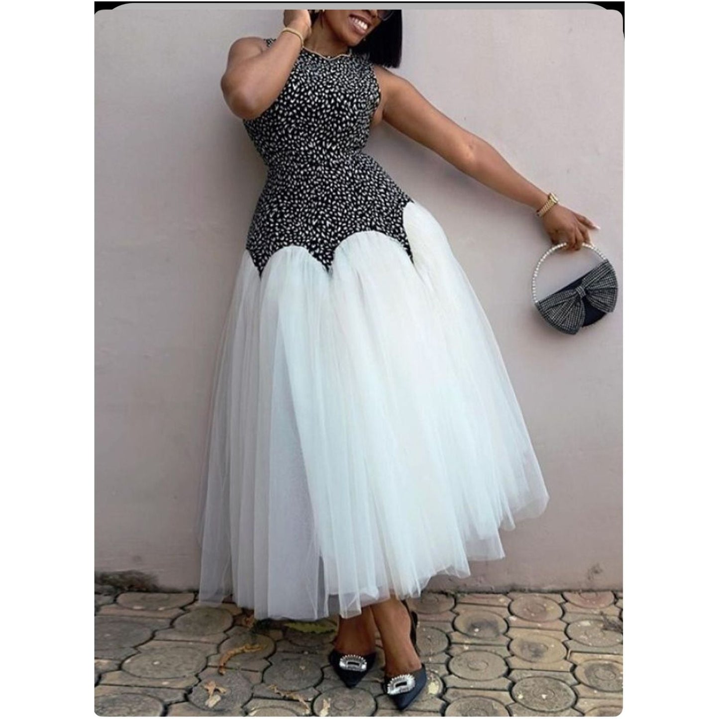 Sleeveless Mermaid Tule Dress.